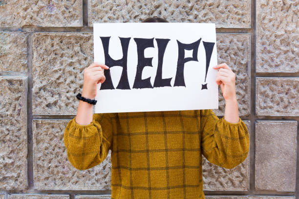 child holding a sign